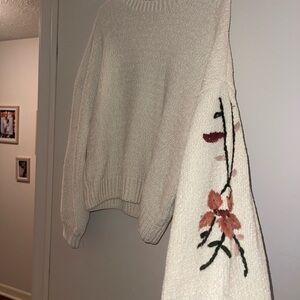 Elegant Cream Sweater with Floral Sleeve